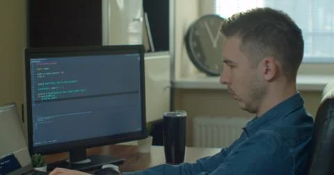 Man coding html and programming on screen Monitors, development web, developer. 스톡 사진