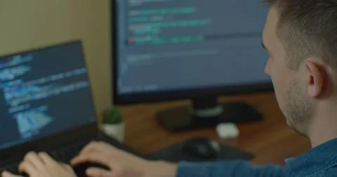 Man coding html and programming on screen Monitors, development web, developer. Foto stock