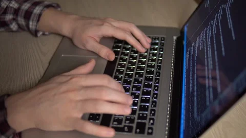 Man coding html website working distance programmer coder freelance Stock Footage 127056947