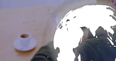 Man coding on laptop with coffee cup in office, merging tech code overlays with Stock Footage 307449904