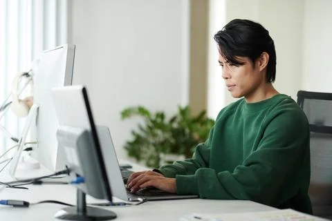 Man Coding on Laptop Stock Photos