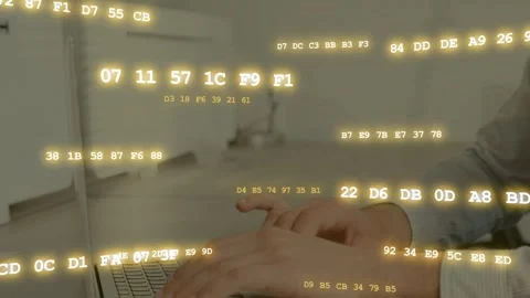 Man coding on laptop, positioning fingers, starting keystrokes as glowing hex Stock Footage 333657481