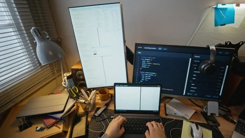 Man Coding Software on Laptop Computer at Home Office Video stock 338421932