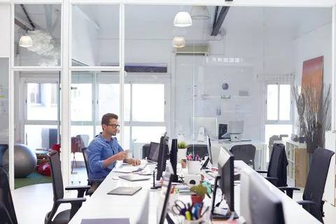Man, coffee and research in creative office with computer, marketing analyt.. Stock Photos