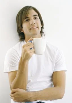 Man with coffee cup Stock Photos