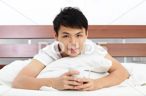 Man with coffee mug Stock Photos