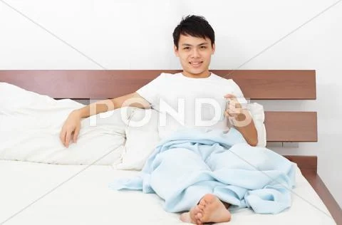 Man with coffee mug Stock Photos