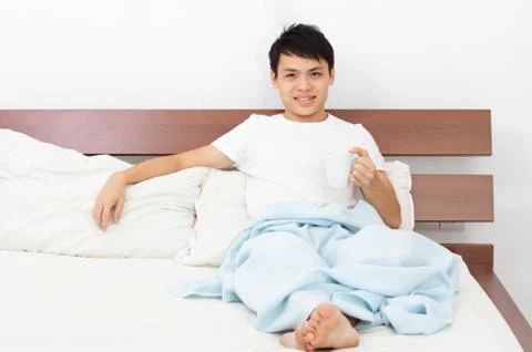 Man with coffee mug Stock Photos