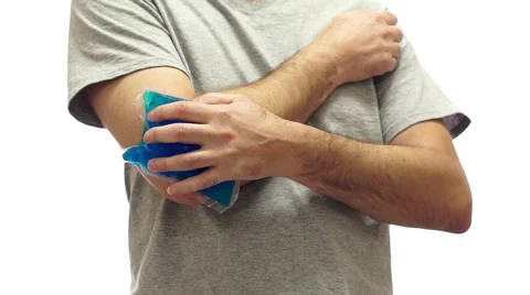 Man With Cold Pack Elbow Pain Video stock 66090186