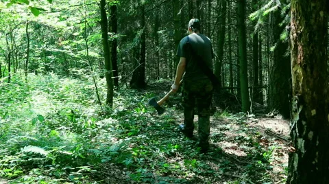 Man With Combat Axe In Forest Stock Footage 40343188