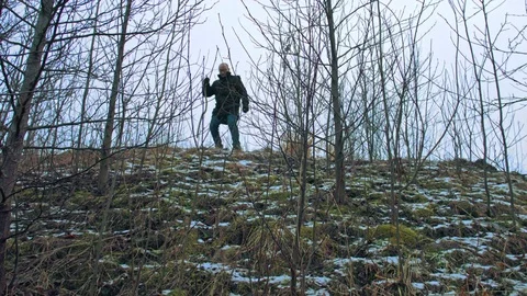 Man comes down from the mountain Stock Footage 83717301