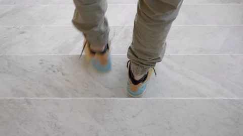 Man comes down the stairs. Stock Footage 153432147