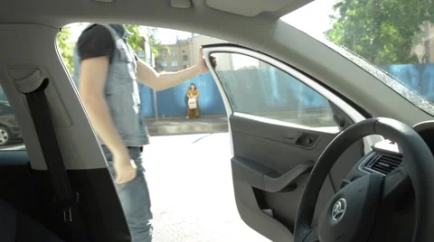 A man comes out of the car. Stock Footage 51756713