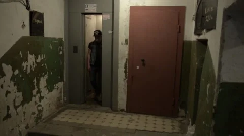 A man comes out of the elevator. Stock Footage 51756061
