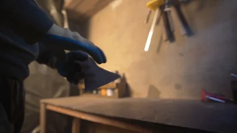 A man comes to the table with the axe Stock Footage 128988538