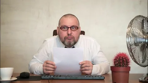 The man comically portrays the office clerk. Stock Footage 170412918