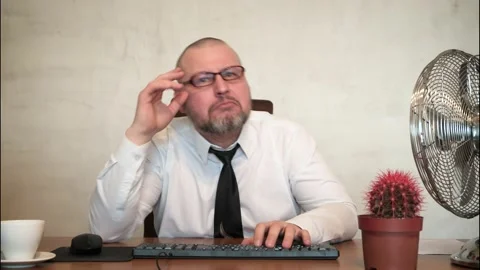 The man comically portrays the office clerk. Stock Footage 170759046