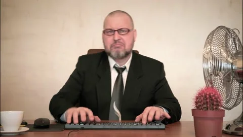 The man comically portrays the office clerk. Stock Footage 171309523