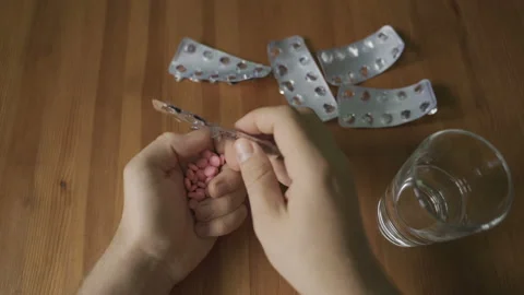 A man commits suicide. Takes a lethal dose of pills Video stock 97975237