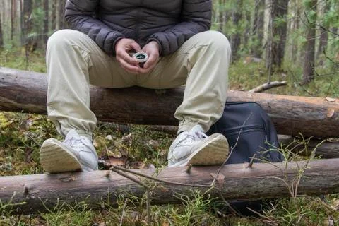 A man with a compass. Stock Photos