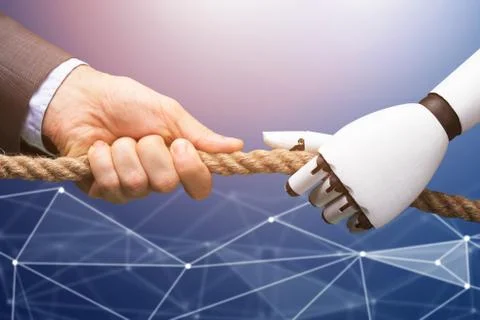 Man Competing With The Robot Pulling Rope 스톡 사진