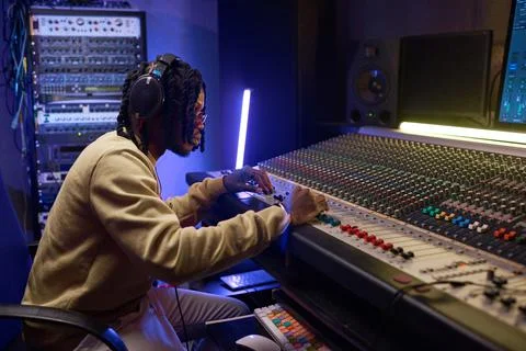 Man composing new music in studio Stock Photos