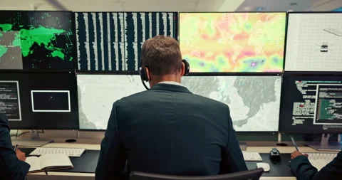 Man, computer and screen with date in control room, monitor weather and climate Stock Footage 317243563