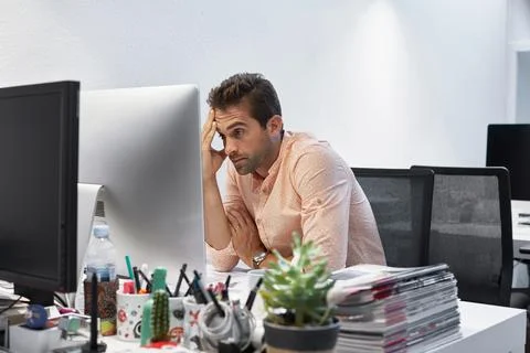 Man, computer and stress in office for review, article editing or missing i.. Stock Photos