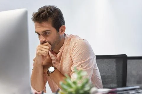 Man, computer and worry in office for reading, article editing or missing i.. Stock Photos
