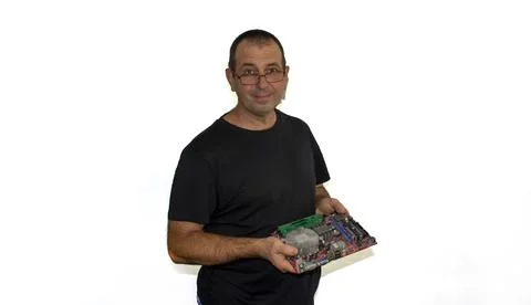 Man with a computer board, programmer, computer technician Stock Photos