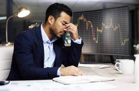 Man, computer screen and stress with graph in office for investment risk 스톡 사진