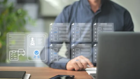Man at computer takes gets driving license test online virtual graphic screen Stock Footage 277443665