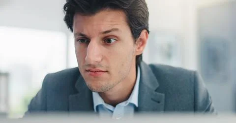 Man, confused and thinking with computer at office, mistake and stress at Foto stock