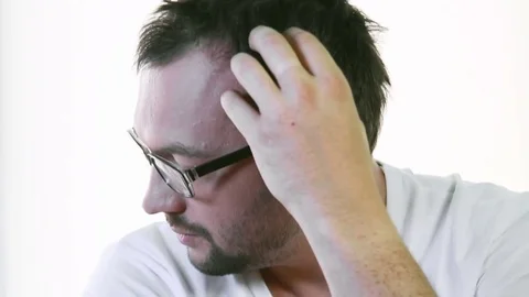 Man is confused in his problems. Slow motions Stock Footage 78140187