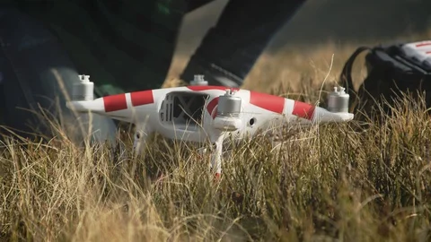Man connect the battery and prepares quadrocopter for flight. 4k Видео 103264405
