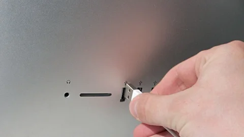 A Man Connect A Usb Flash Drive To A Laptop Stock Footage 89094241