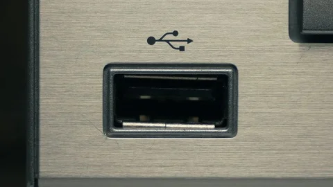 The man connects black USB cable. Close-up Stock Footage 84479403