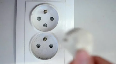 Man connects the cable to the socket Stock Footage 48786915