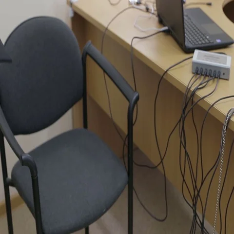 Man connects the lie detector, polygraph. Hi-tech Stock Footage 69326957