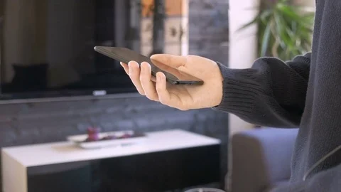 Man connects usb-c contakt to a smartphone Stock Footage 81145409