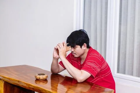 Man Considering Decisions While Sitting. Serene Moment of a Man in Deep Tho.. Stock Photos