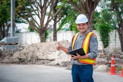Man construction engineer at construction site 스톡 사진