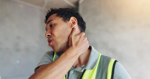 Man, construction worker and neck pain for renovation, project and stress with Stock Photos