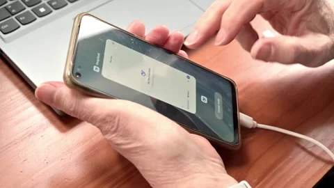 Man consulting DeepSeek artificial intelligence on his mobile phone Stock Footage 325418283