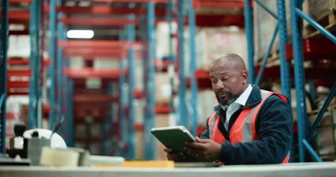 Man, contractor and warehouse with tablet for logistics, supply chain or Stock Footage 326094045
