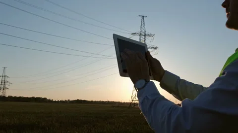 Man with control panel works Stock Footage 137456120