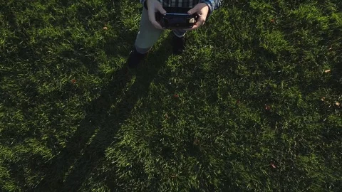 Man Controling Drone Upwards Video stock 97008038