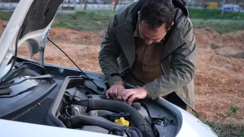 Man controlling car engine Stock Footage 195487351