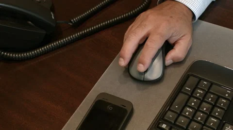 Man controlling a computer mouse Stock Footage 68197244
