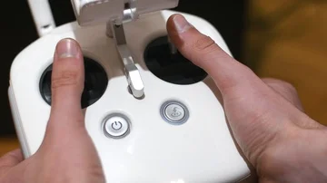 Man Controlling A Drone Joystick Stock Footage 85853956